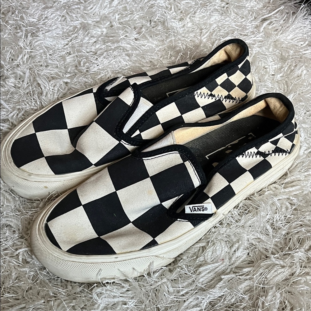 Vans Black and White Checkerboard Slip-Ons